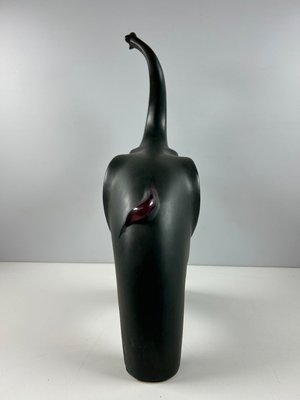 keramik skulptur af elefant.