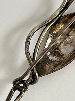 Rav sølv broche