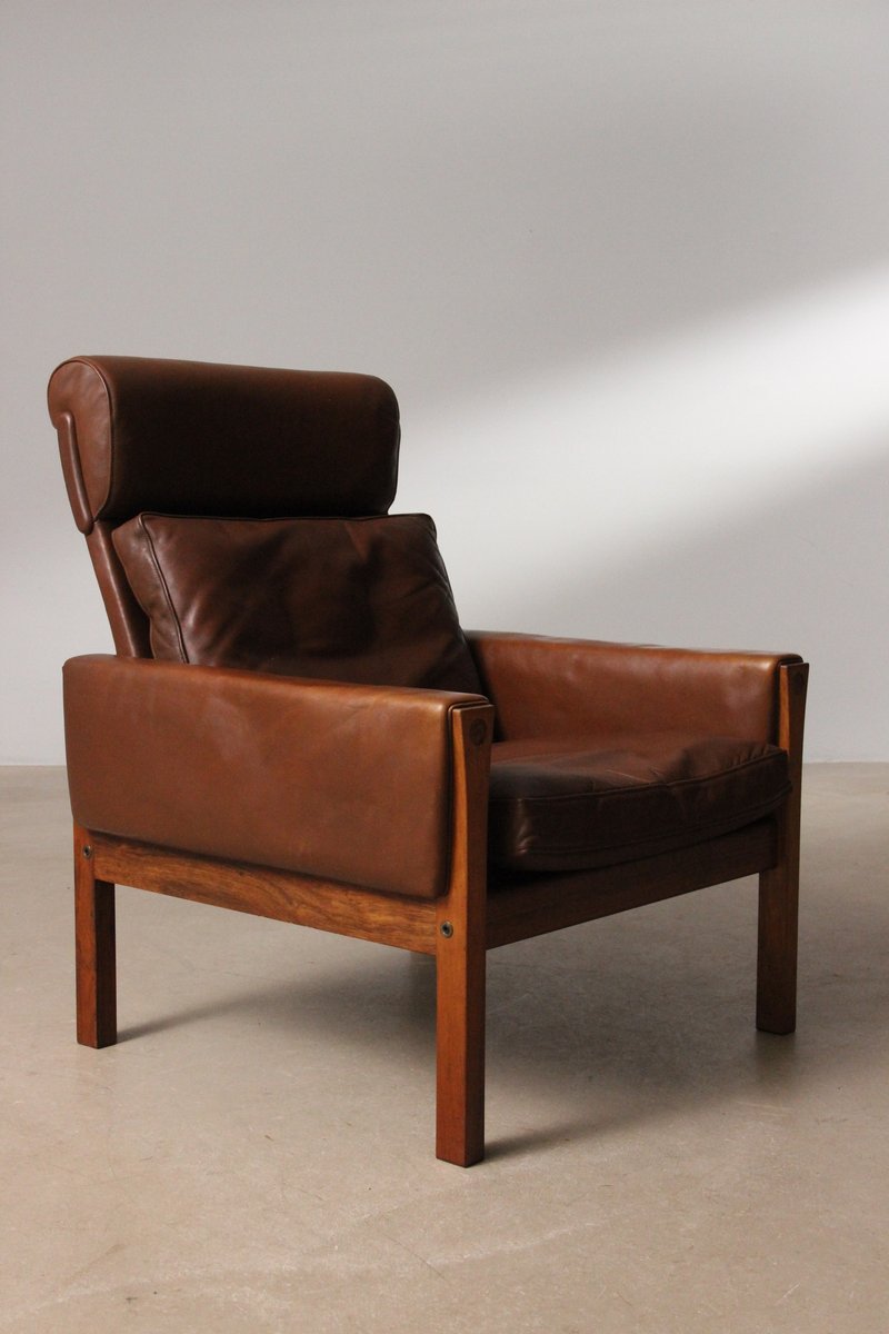 Hans J. Wegner AP62 lænestol i teak og læder