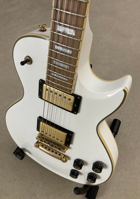 Supreme Rage hvid single cut elguitar med guld hardware