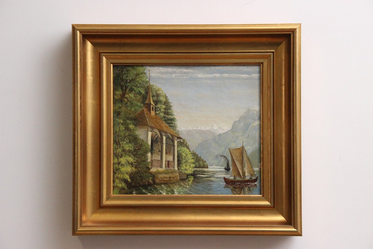 Landskabsmaleri i gylden ramme