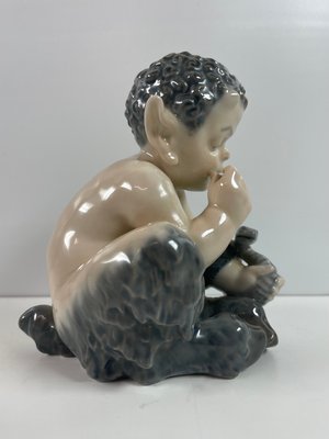 Royal Copenhagen figur Faun med slange nr. 1712