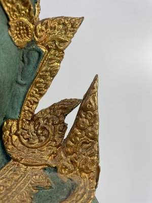 Thailandsk Buddha i grøn og guld